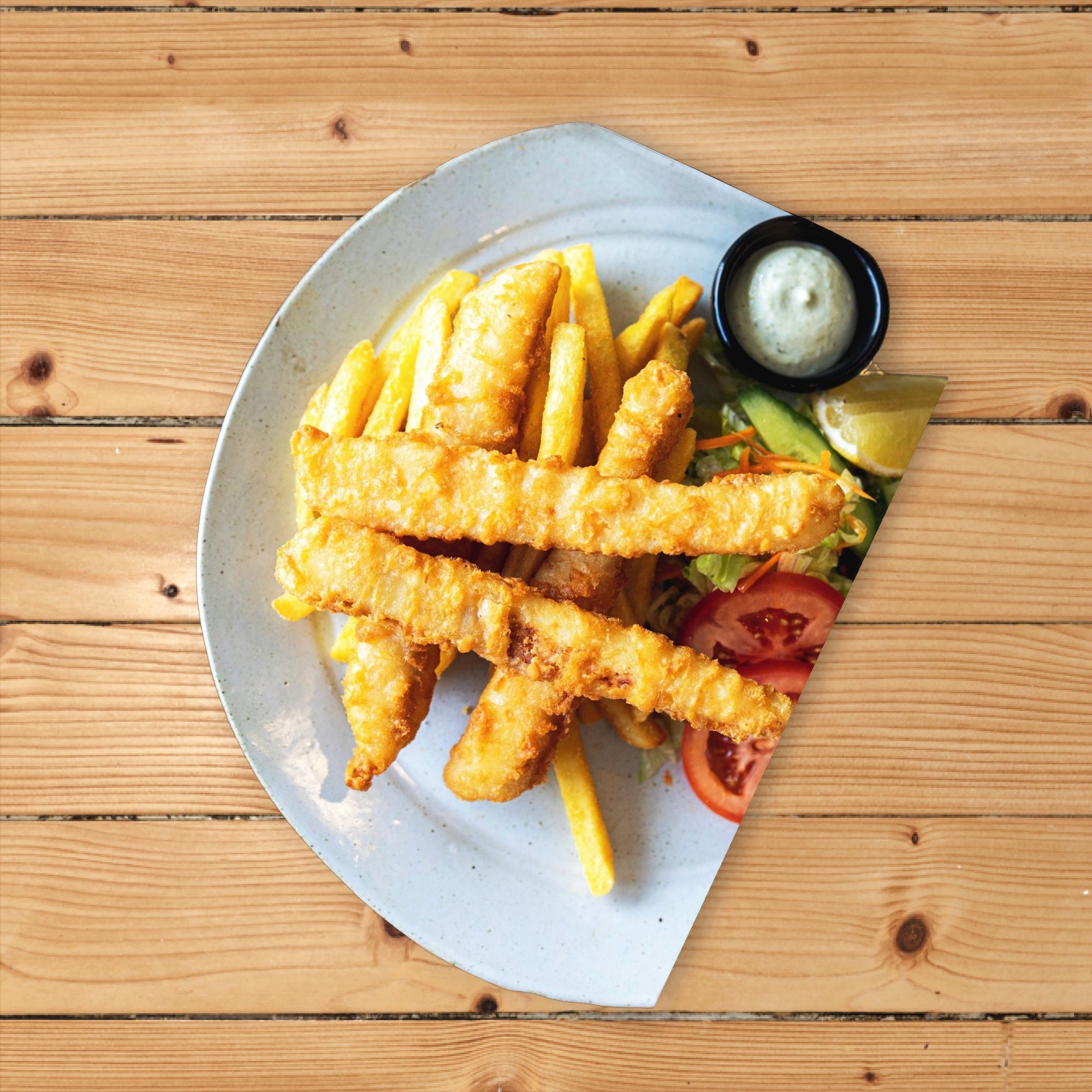 Beer battered fish and chips with salad and tartare